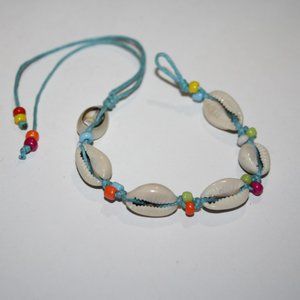 Beautiful blue and shell tie on bracelet 6.5-9"